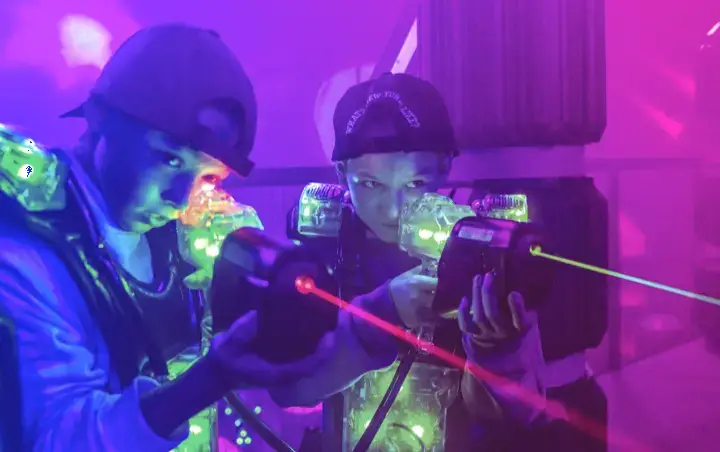 Two lasertag players in action