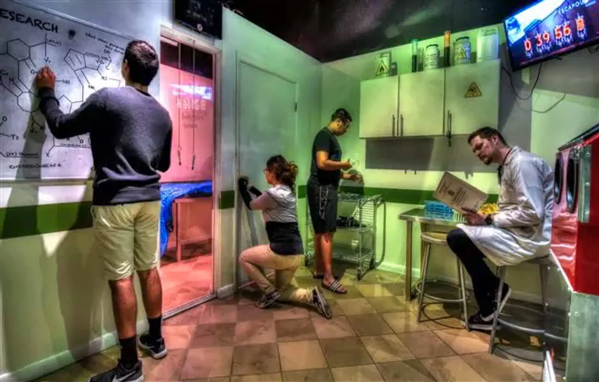 A group searching for clues in an escape room game